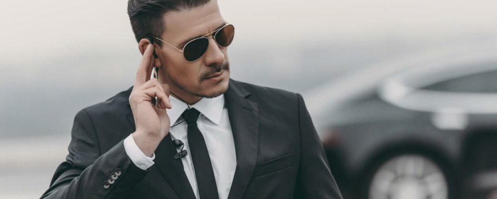 handsome-bodyguard-listening-message-with-security-2021-08-29-18-18-52-utc