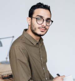 young-businessman-in-casualwear-and-eyeglasses-loo-JB4ZZET