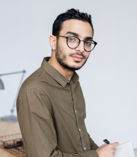 young-businessman-in-casualwear-and-eyeglasses-loo-JB4ZZET