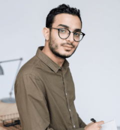 young-businessman-in-casualwear-and-eyeglasses-loo-JB4ZZET