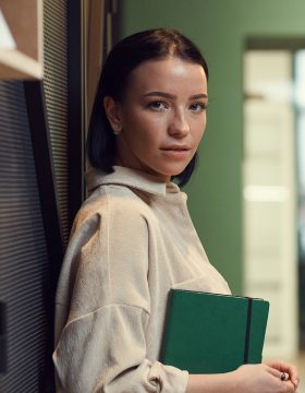 businesswoman-with-notepad-at-office-2021-08-27-14-34-06-utc