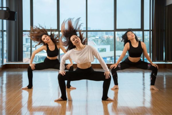 asian-women-shaking-hair-while-dancing-2021-08-26-19-52-52-utc