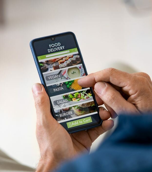 man-using-mobile-app-to-order-delivery-food-ERC7BZ5