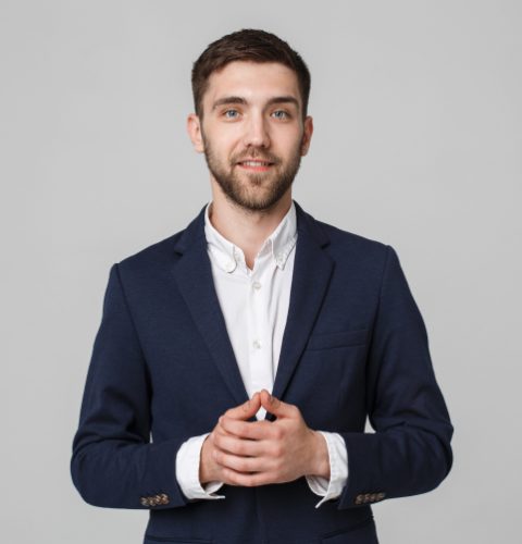 placeit-portrait-handsome-businessman-holding-hand-4PYLLXJ