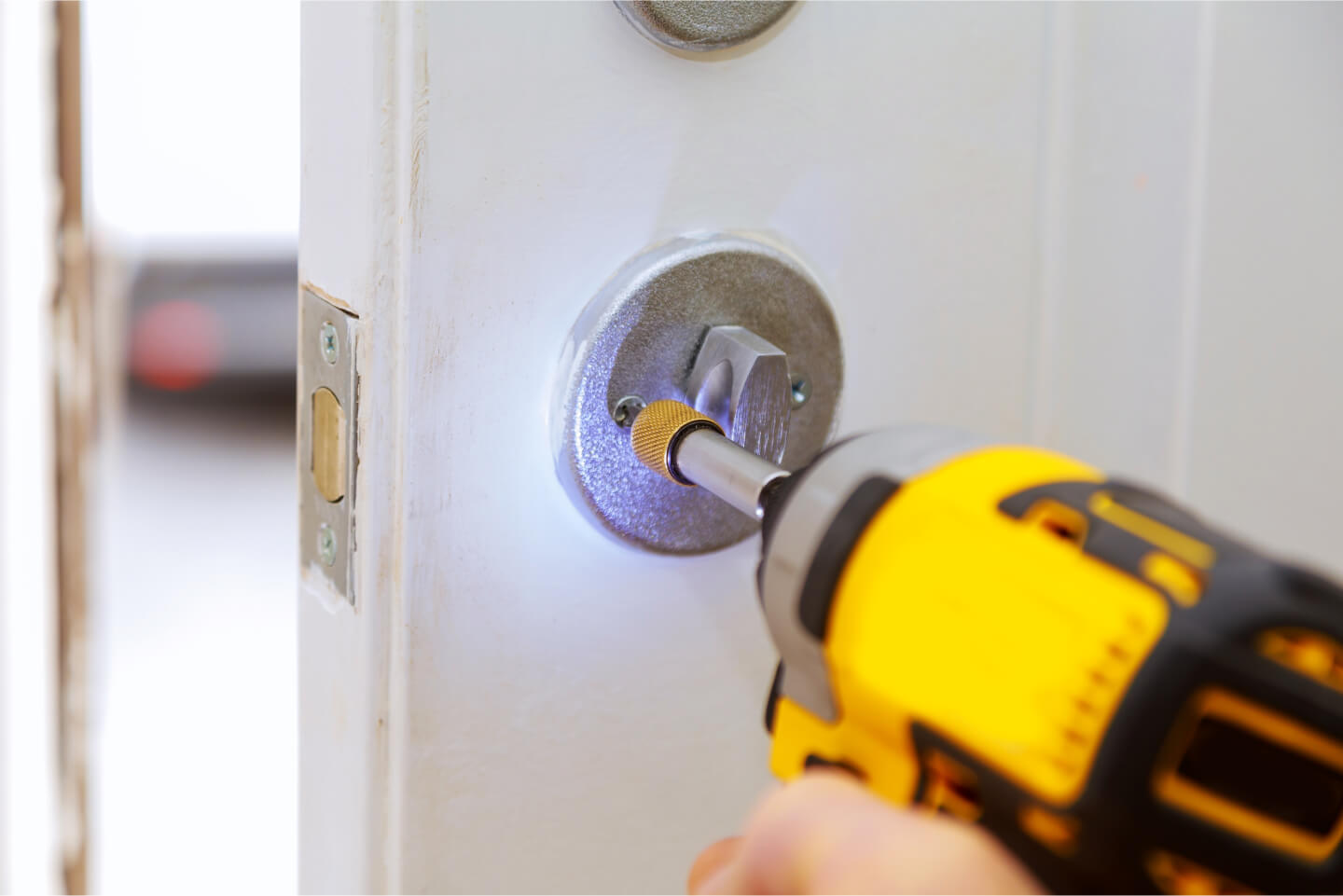 closeup-of-a-professional-locksmith-installing-a-n-2021-08-31-02-35-22-utc