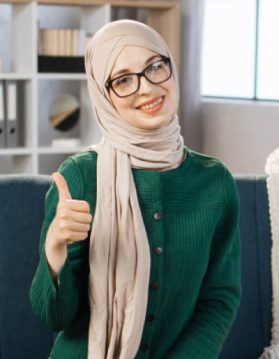 portrait-of-muslim-girl-in-hijab-playing-piano-2022-07-06-17-53-04-utc