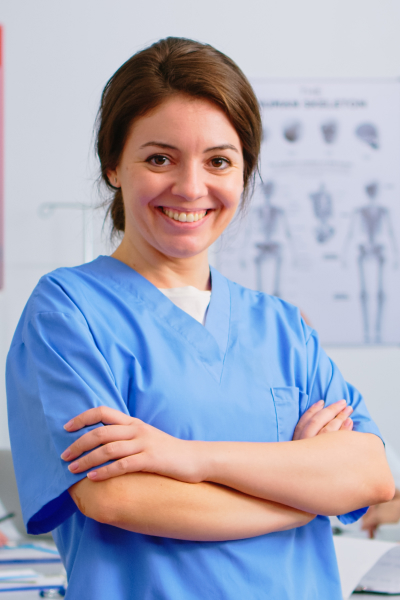 portrait-of-young-nurse-standing-in-front-of-camer-2022-02-03-10-43-47-utc