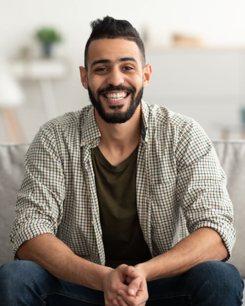 portrait-of-handsome-young-arab-man-smiling-and-lo-2021-12-09-19-23-26-utc