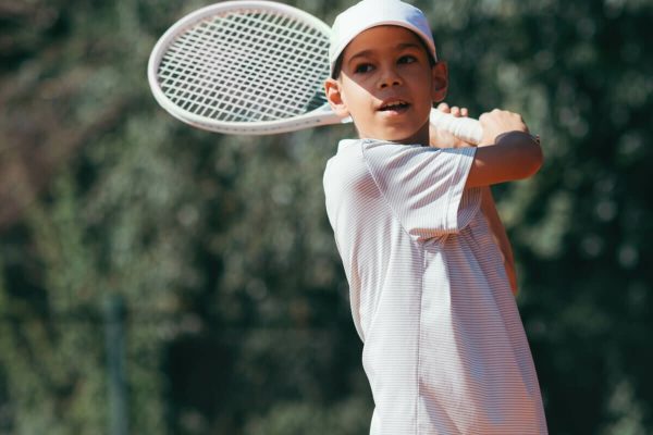 tennis-instructor-with-boy-in-tennis-lesson-2021-08-26-16-54-04-utc